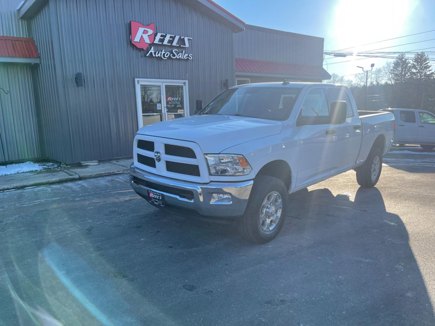 2016 White /Black RAM 2500 Outdoorsman Crew Cab SWB 4WD (3C6UR5DL4GG) with an 6.7L I6 OHV 24V TURBO DIESEL engine, 6A transmission, located at 11115 Chardon Rd. , Chardon, OH, 44024, (440) 214-9705, 41.580246, -81.241943 - Photo#0